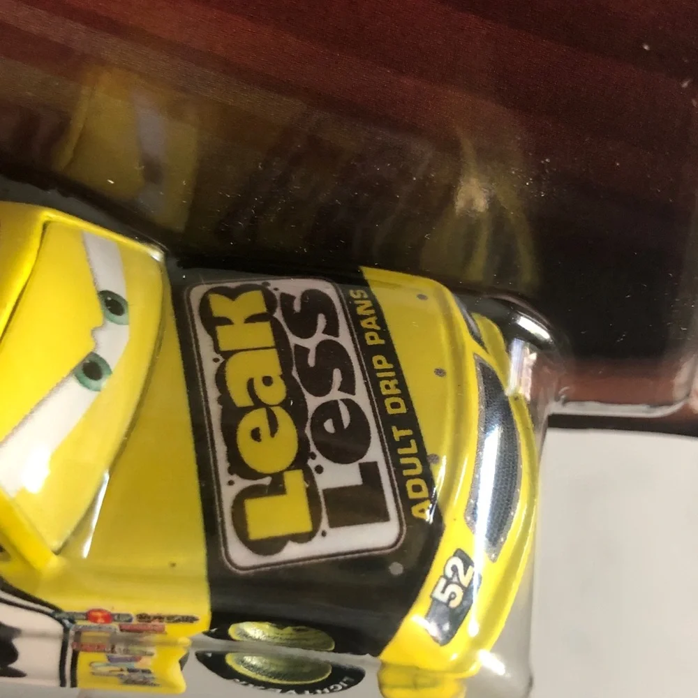 Mattel Disney Pixar Cars Claude Scruggs Toy Car - Yellow and Black